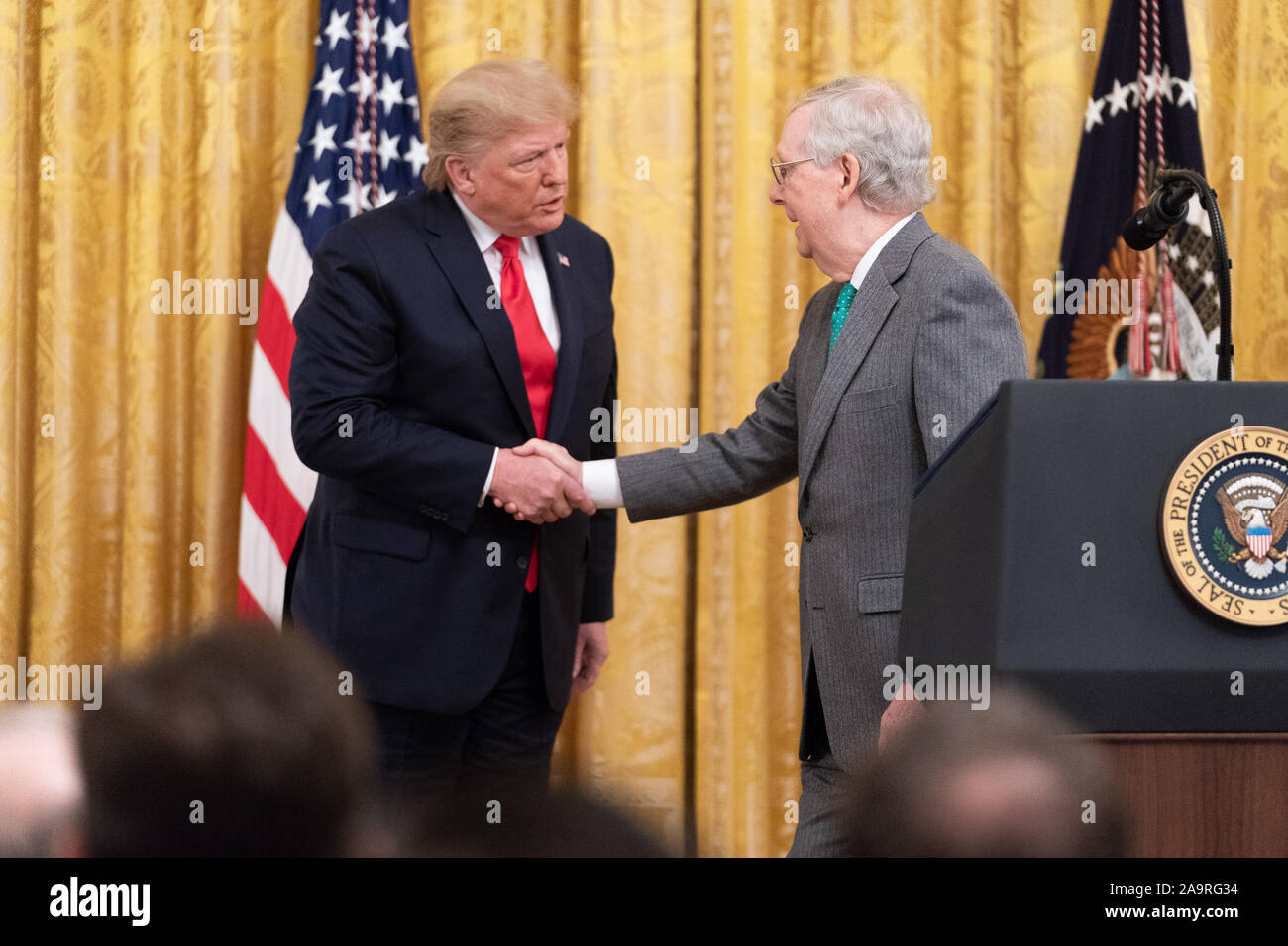 President Donald J. Trump honors Senate Majority Leader Mitch McConnell during the federal judicial confirmation milestones event, Wednesday, Nov. 6, 2019, in the East Room of the White House. Stock Photo