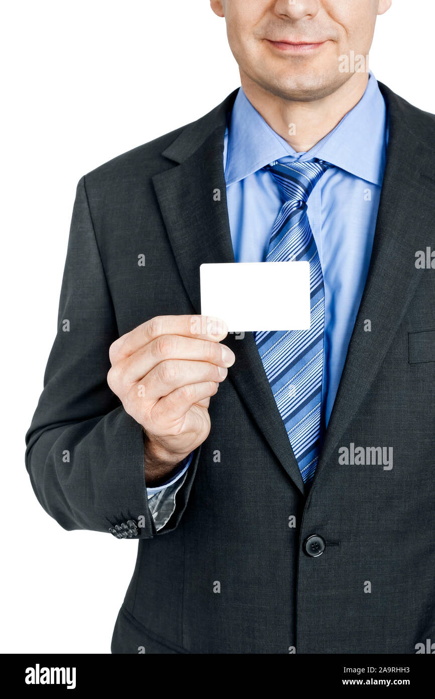 A handsome business man is holding a card Stock Photo
