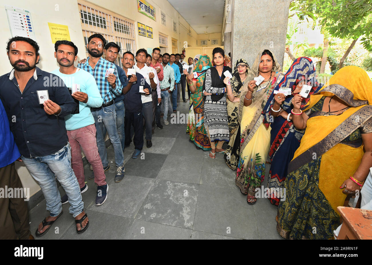 Indian people standing in queue hi-res stock photography and images - Alamy