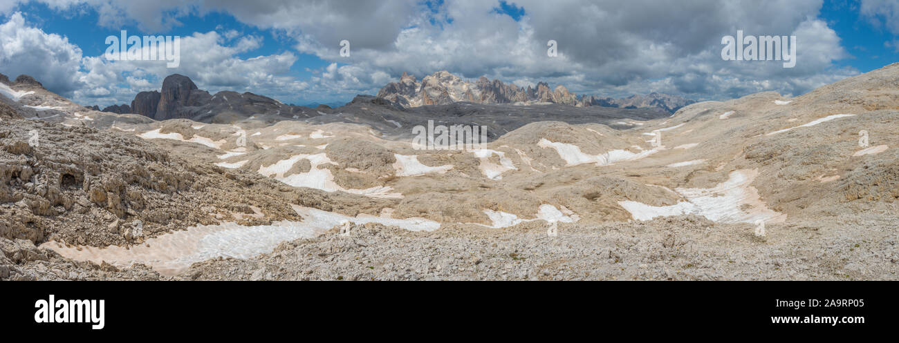 Open views of the Rosetta plateau in the Dolomites. Rocky, deserted moonscape in the mountains. Panorama of barren mountainscape, alpine scenary. Stock Photo