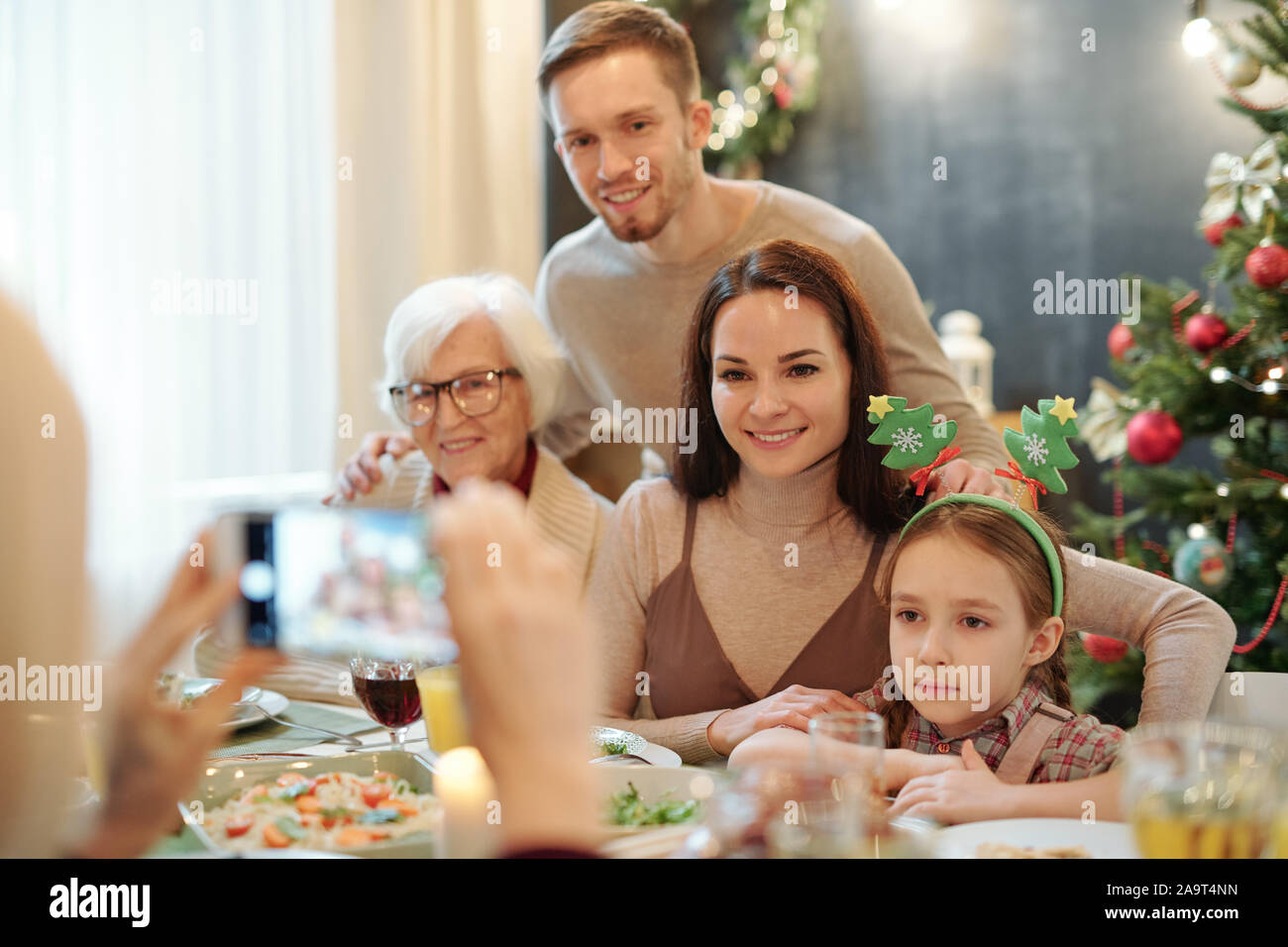 Happy family at christmas table hi-res stock photography and images - Alamy
