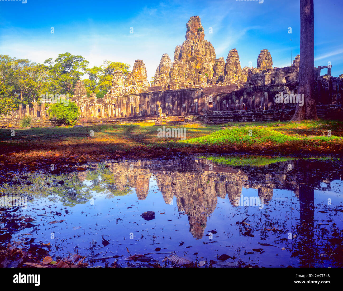 Bayon Temple relections, Angkor Watt Acheological Park, Cambodia, City of Angkor Thom Built 100-1200 AD KHmer Culture ruins in SE Asia jungle- Stock Photo