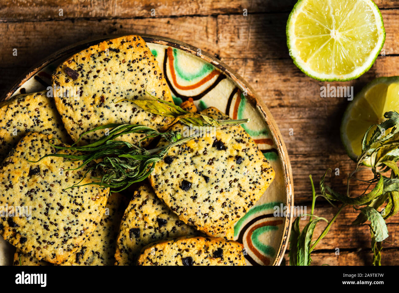 Cookies with marijuana and chia seeds on a wooden table Stock Photo
