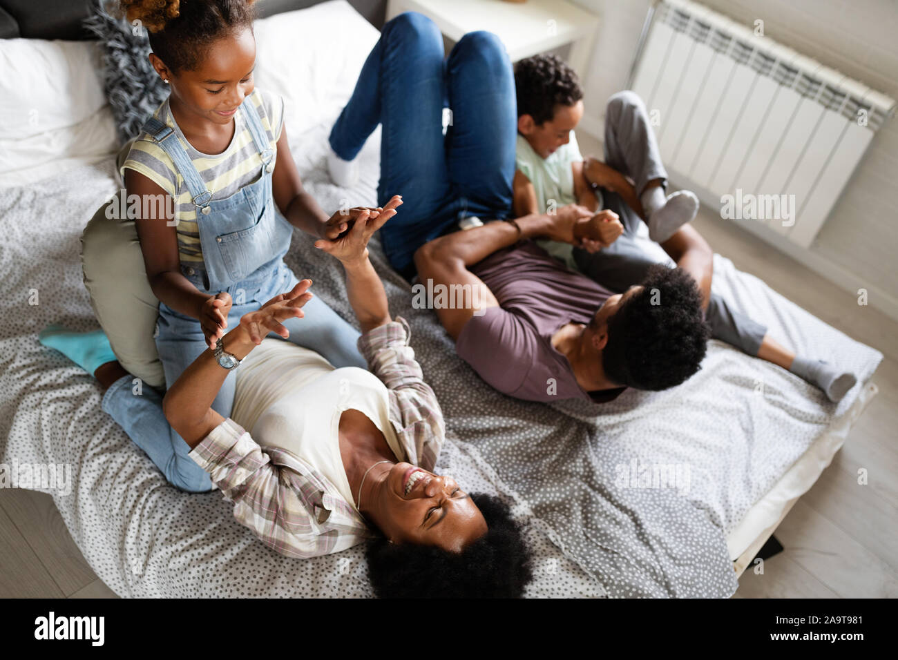 Happy black family having fun times at home Stock Photo - Alamy