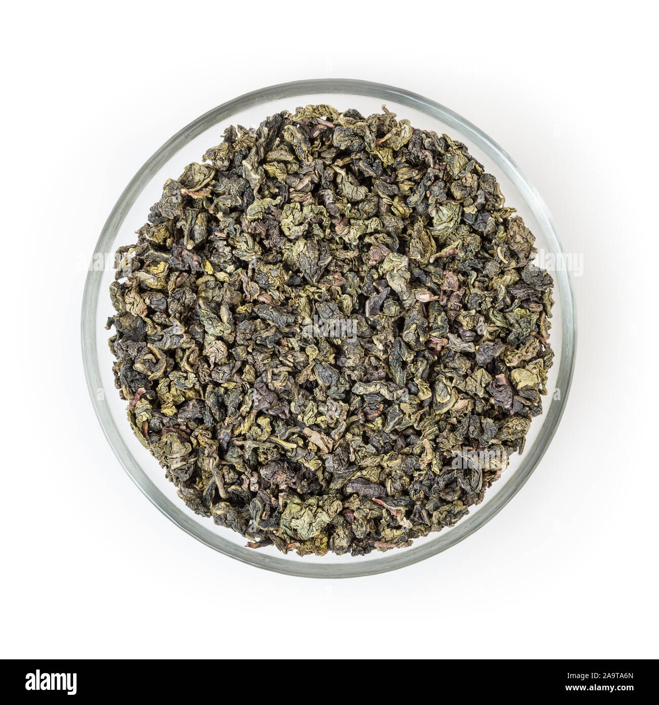 Milk oolong green tea in glass bowl isolated on white background with