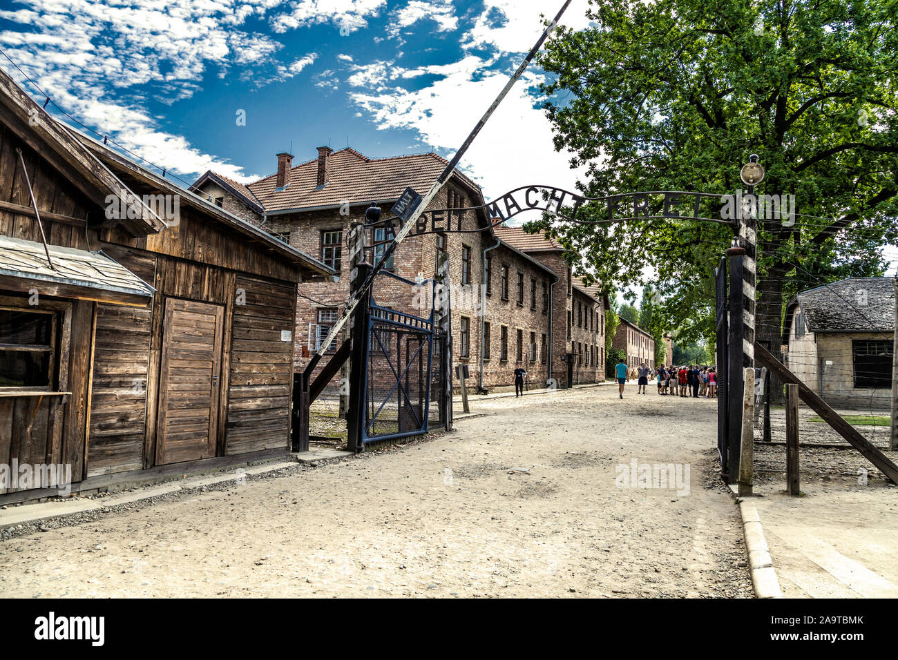 Entrance gate with motto 'Arbeit Macht Frei' on top at Auschwitz I concentration camp, Poland Stock Photo
