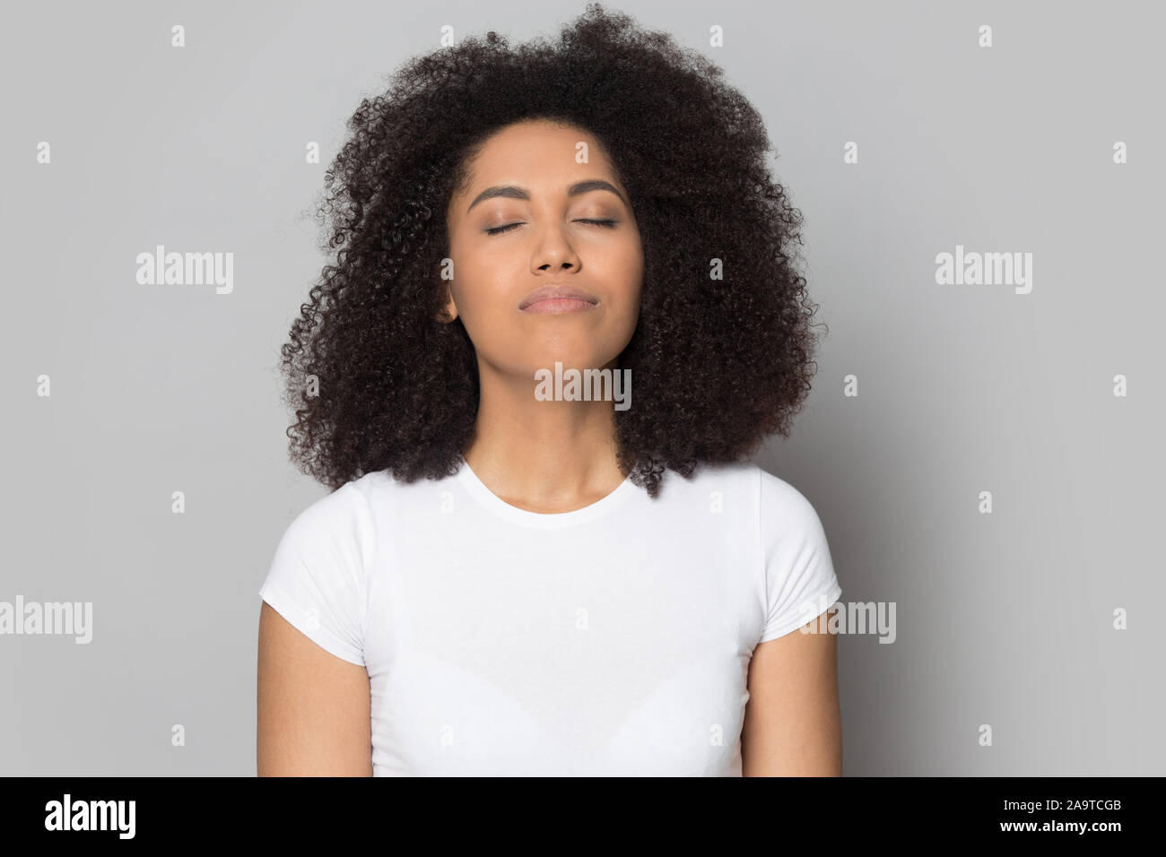 Head Shot Relaxed African American Girl With Closed Eyes Stock