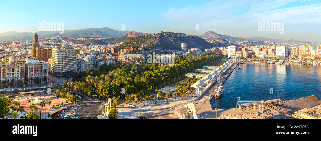 Malaga, Spain - June 29, 2018. Panoramic view of the Malaga city, Cathedral of the Incarnation, palatial fortification Alcazaba, Marriott hotel, Water Stock Photo