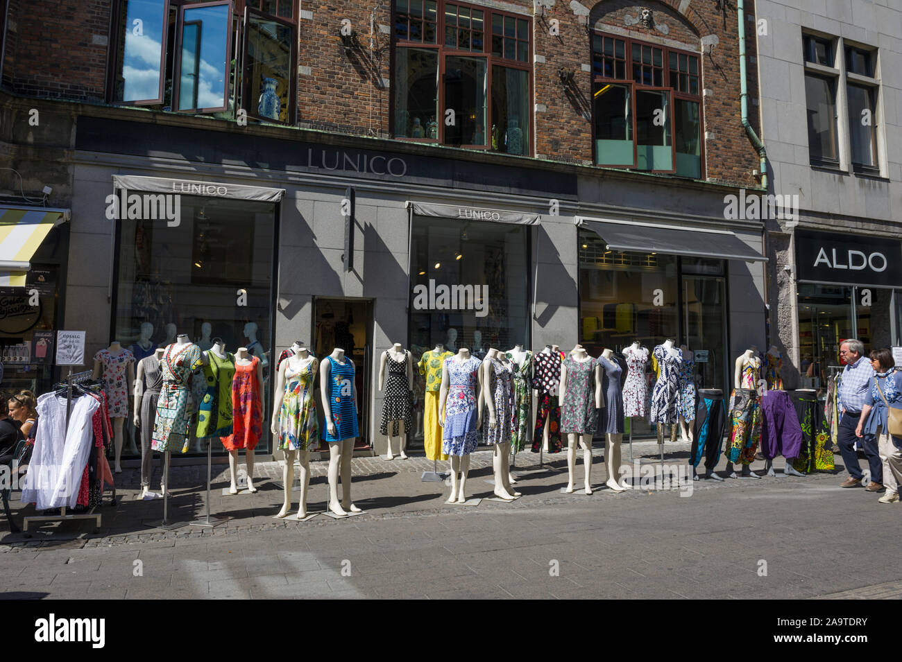Rows of fully clothes female mannequins on display on the street outside a  shop in Copenhagen, Denmark Stock Photo - Alamy