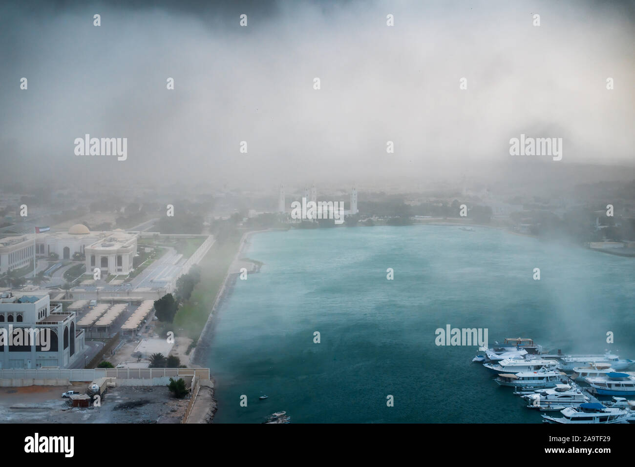 Sandstorm and extreme weather over Al Bateen Marina in Abu Dhabi the capital city of the UAE Stock Photo