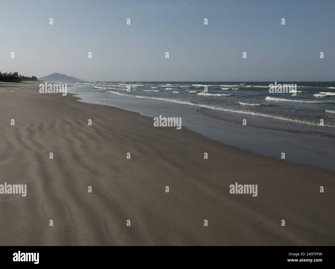 Wide, emtpy and abandoned Lang Co sand beach, Vietnam Stock Photo
