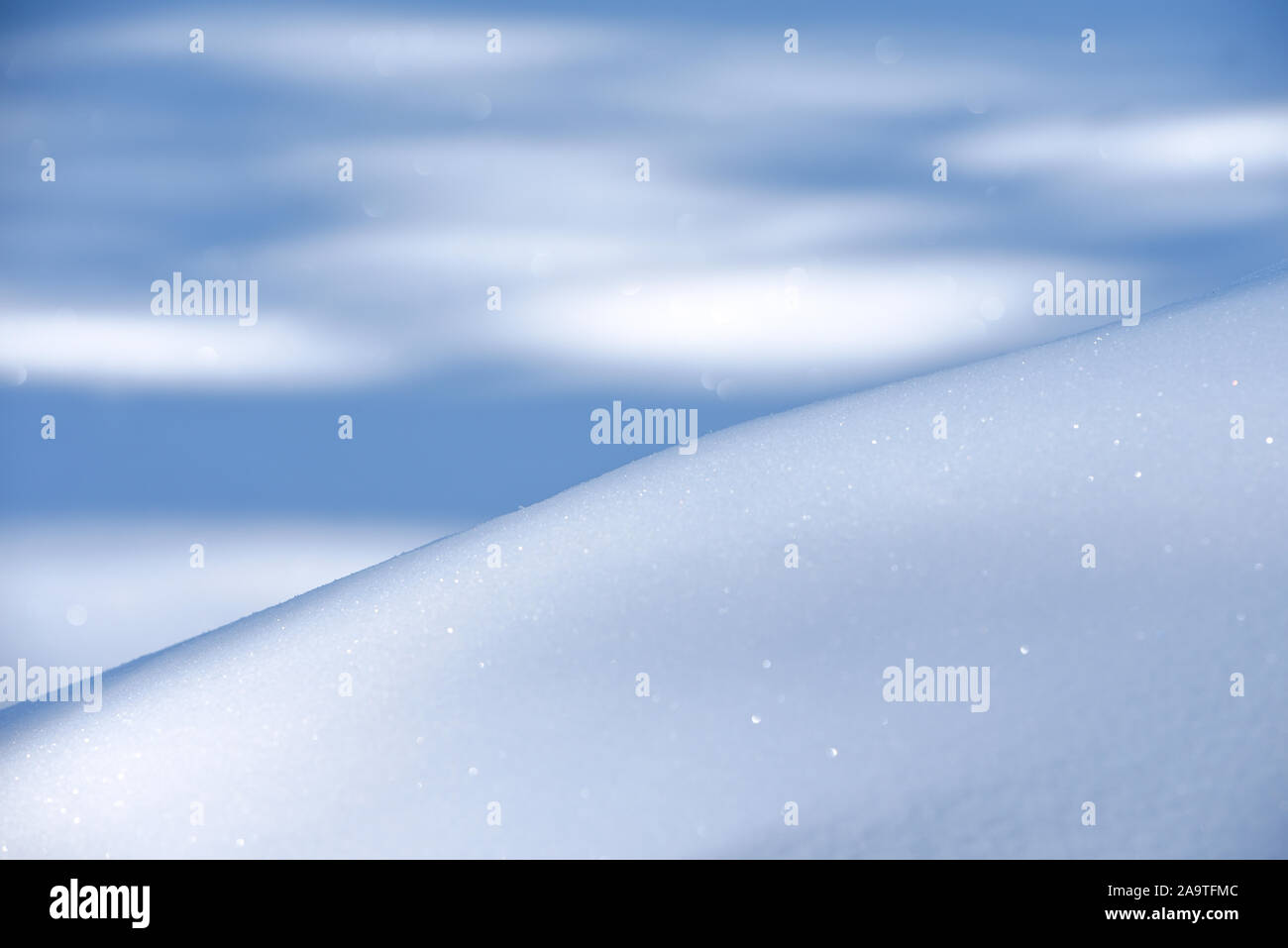 Beautiful fresh snow patterns. Winter background. Close up texture. Stock Photo