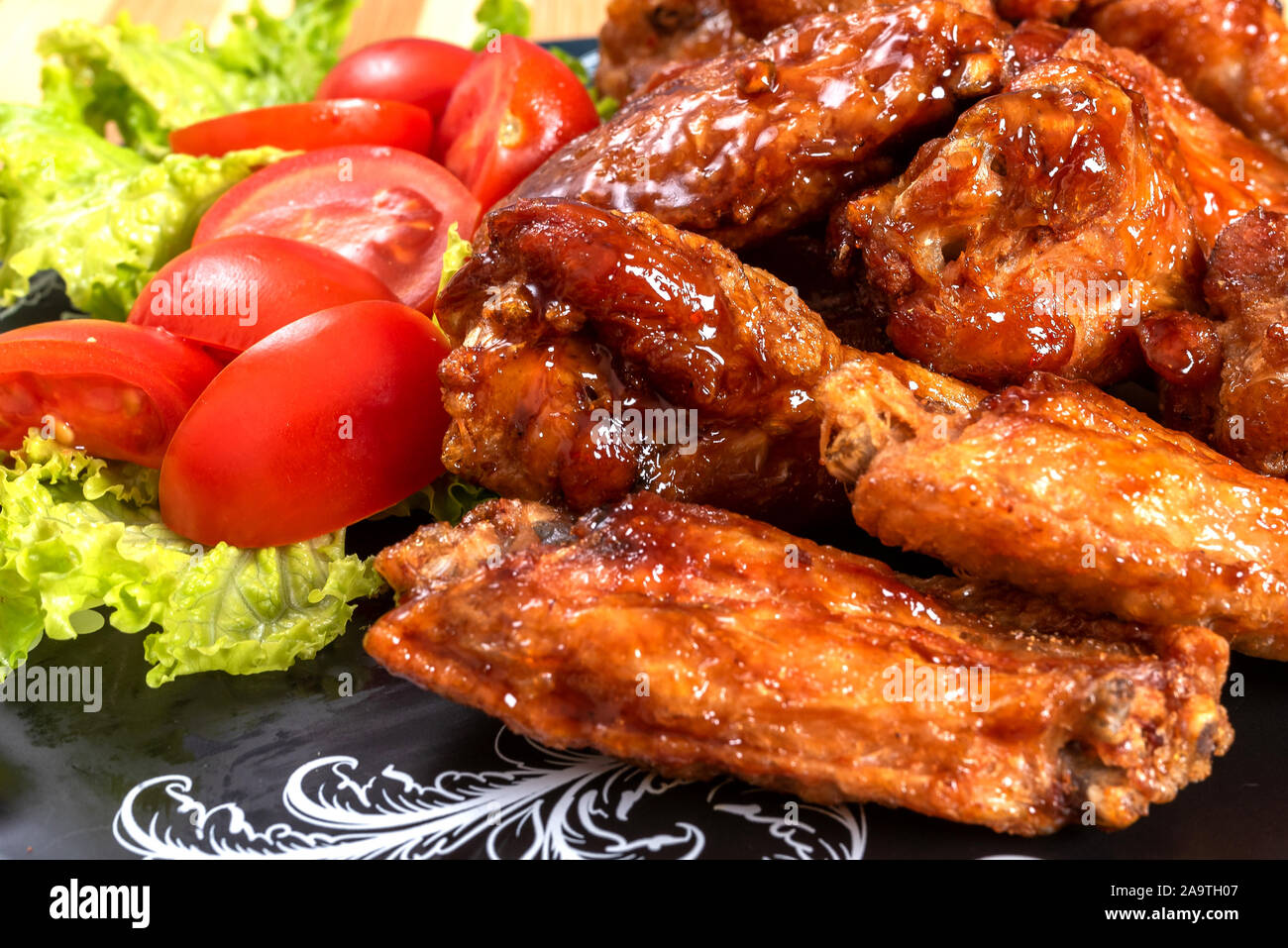 Chicken wings in sweet and sour sauce Stock Photo Alamy