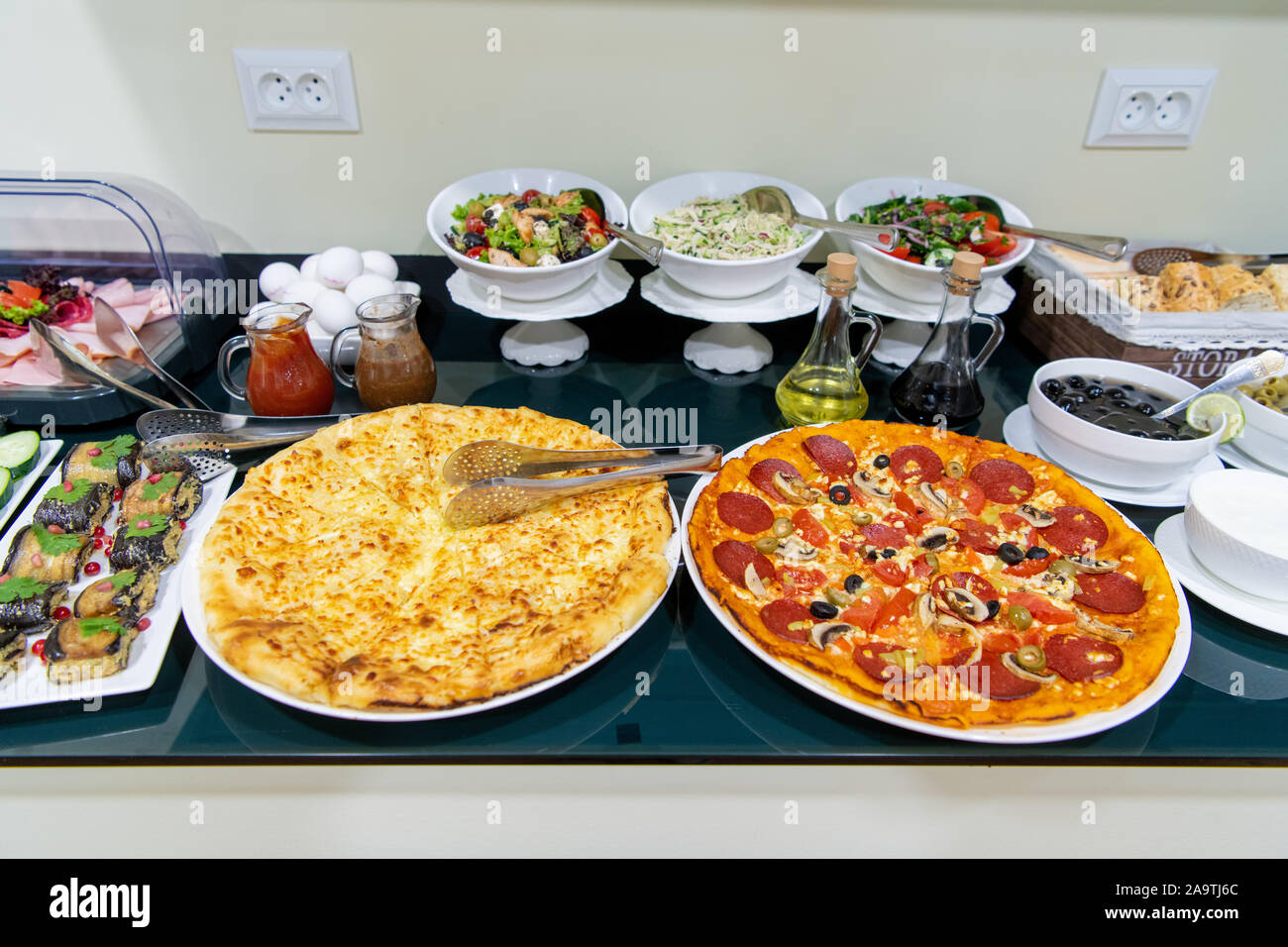Food And Buffet Decoration With Pizza And Lots Of Dishes Stock