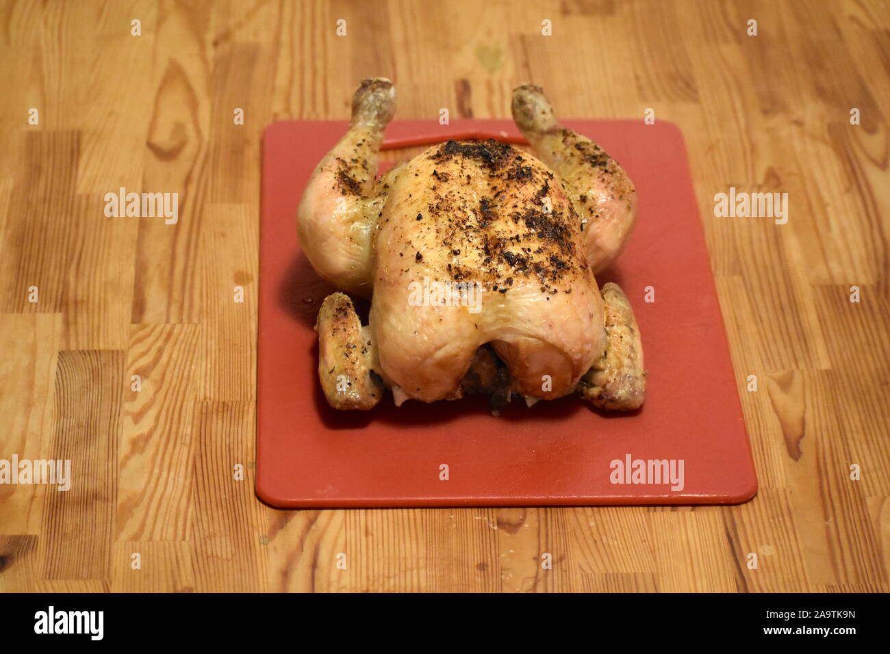 One whole oven roast chicken with rosemary and garlic. Crispy skin with