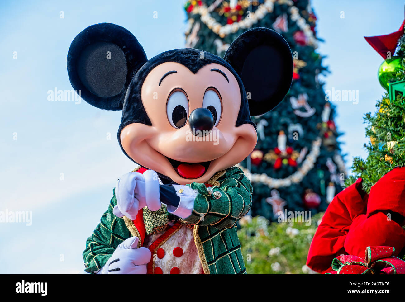 Mickey Mouse in Christmas outfits in the Christmastime Parade Stock Photo