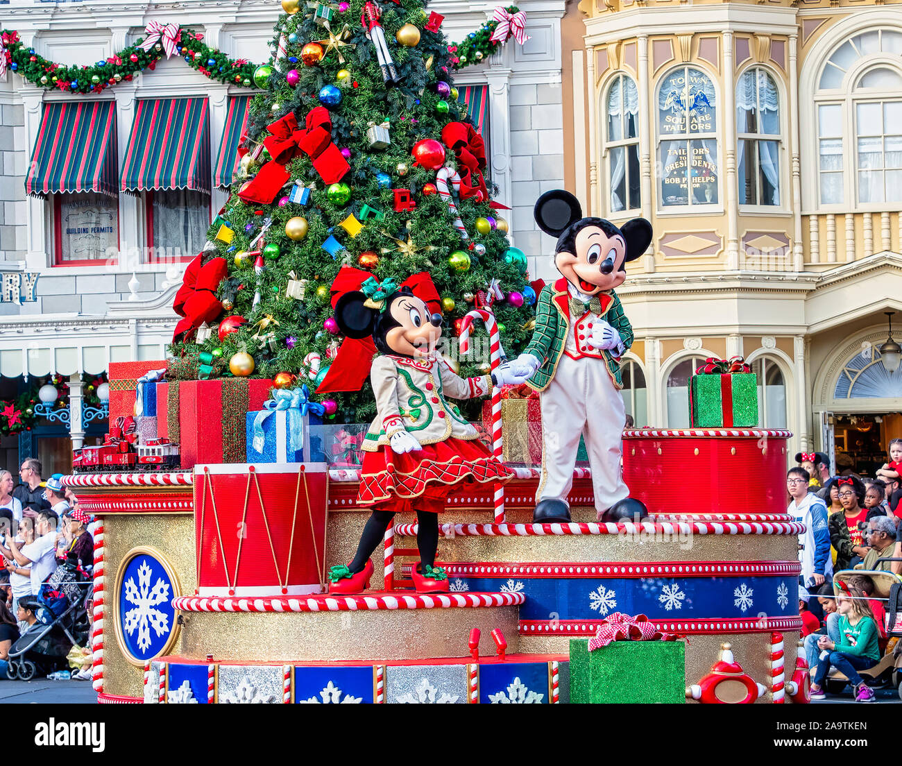 Mickey and Minnie Mouse in Christmas outfits in the Christmastime Parade Stock Photo