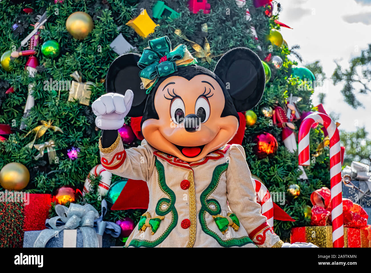 Minnie Mouse in Christmas outfits in the Christmastime Parade Stock Photo