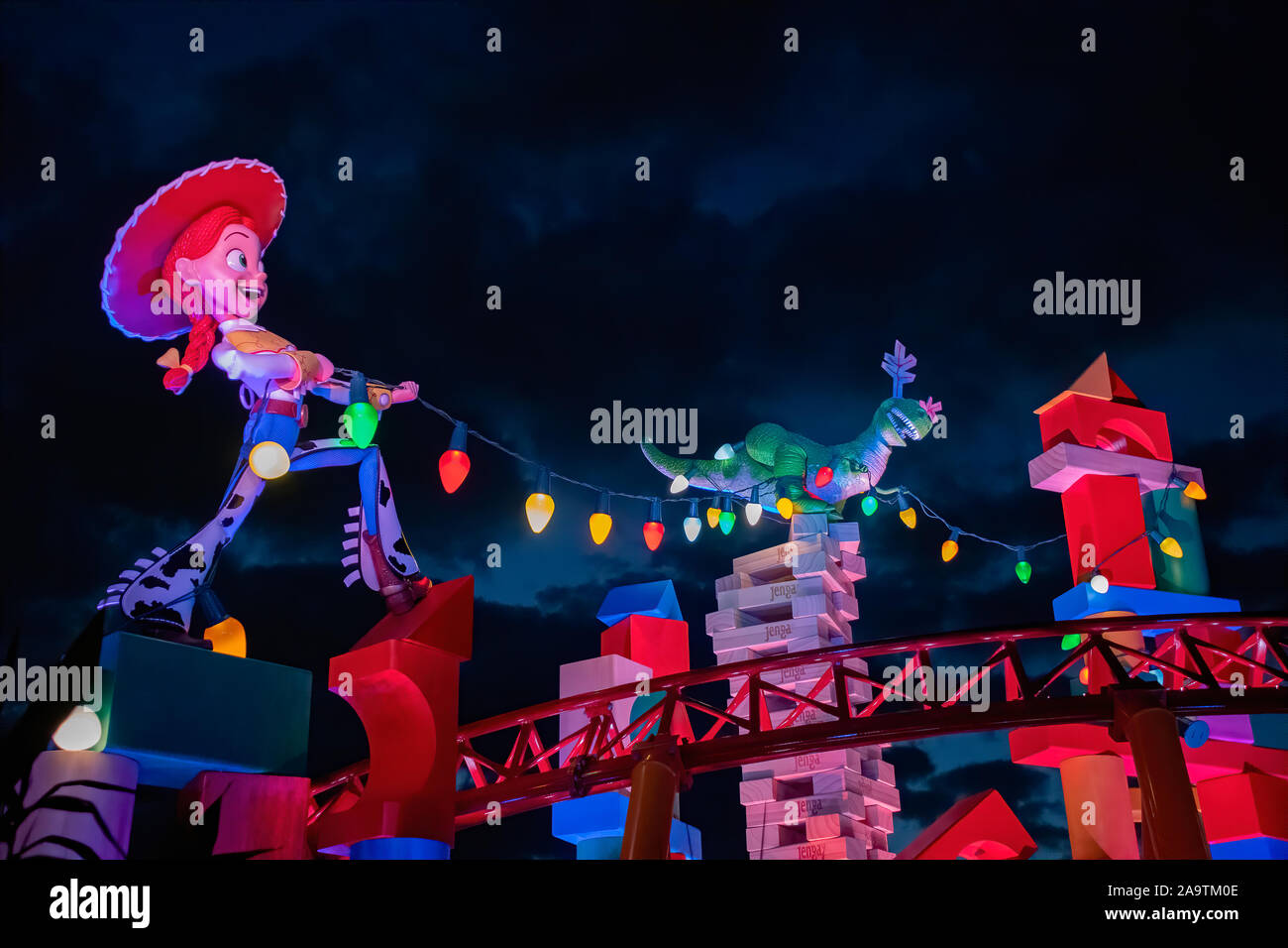 Night time image from Jessie and Rex at the Slinky Dog rollercoaster Stock Photo