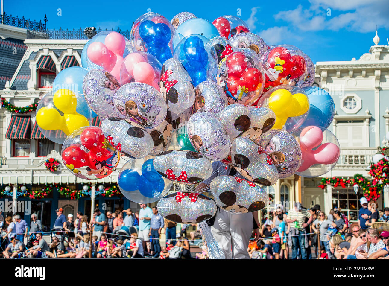 Large bunch of Disney balloons at the Magic Kingdom Stock Photo Alamy
