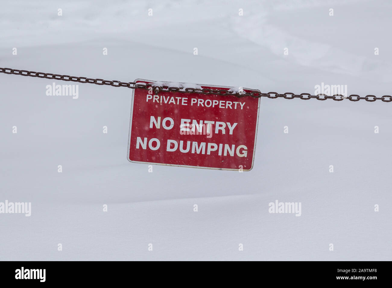 A sign saying private property, no entry and no dumping Stock Photo