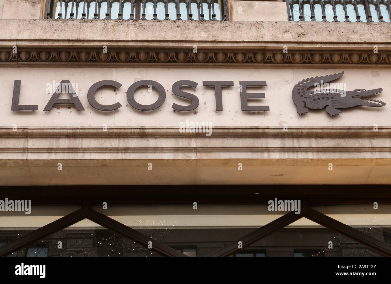 Logo Lacoste Logo Lacoste crocodile. Stock Photo