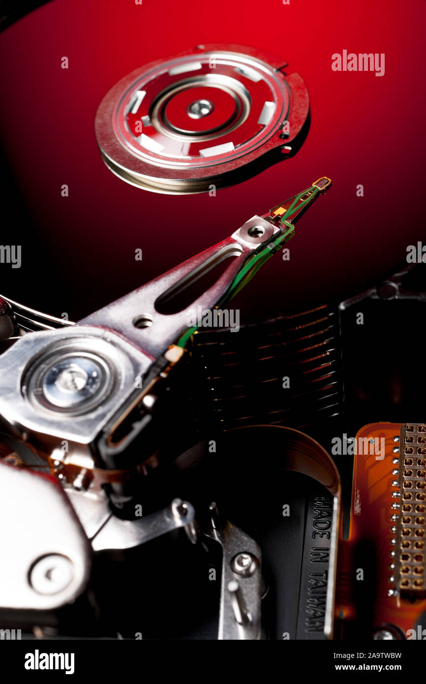 Opened and Exposed Hard Drive Platters in Red Stock Photo Alamy