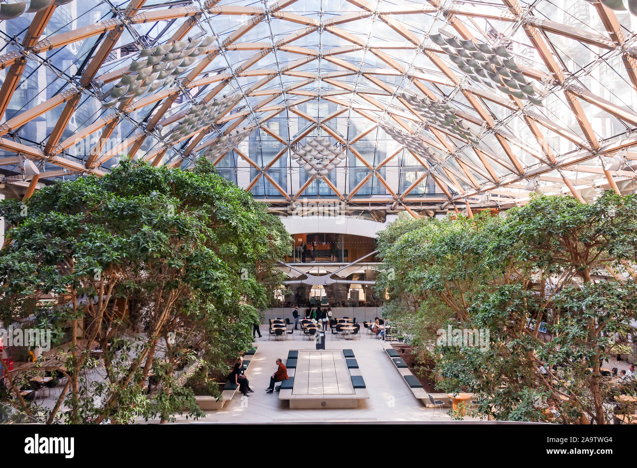 LONDON, ENGLAND  - OCT 21ST 2019: The glass roof of Portcullis House open to the public for the annual Open House event. Stock Photo