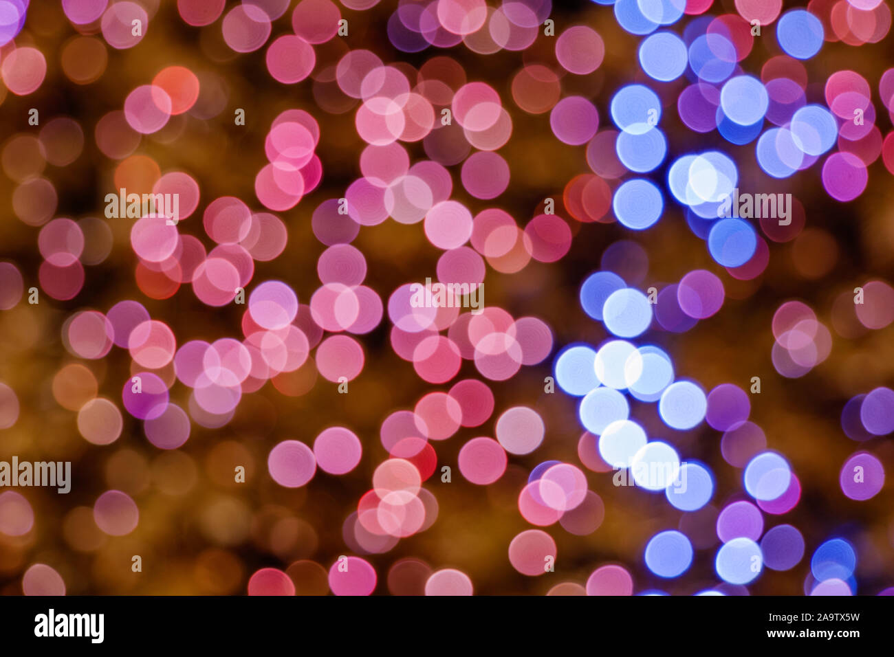 Illuminated Abstract round pink, purple, magenta, blue and gold bokeh ...