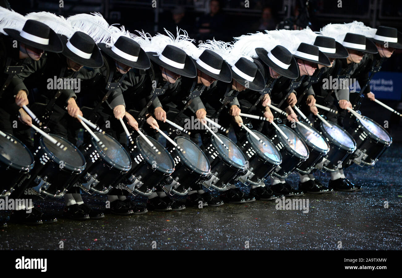 The Top Secret Drum Corps a drum corps based in Basel, Switzerland. With 25 drummers and colour guard section perform at the Edinburgh Military Tatt00 Stock Photo