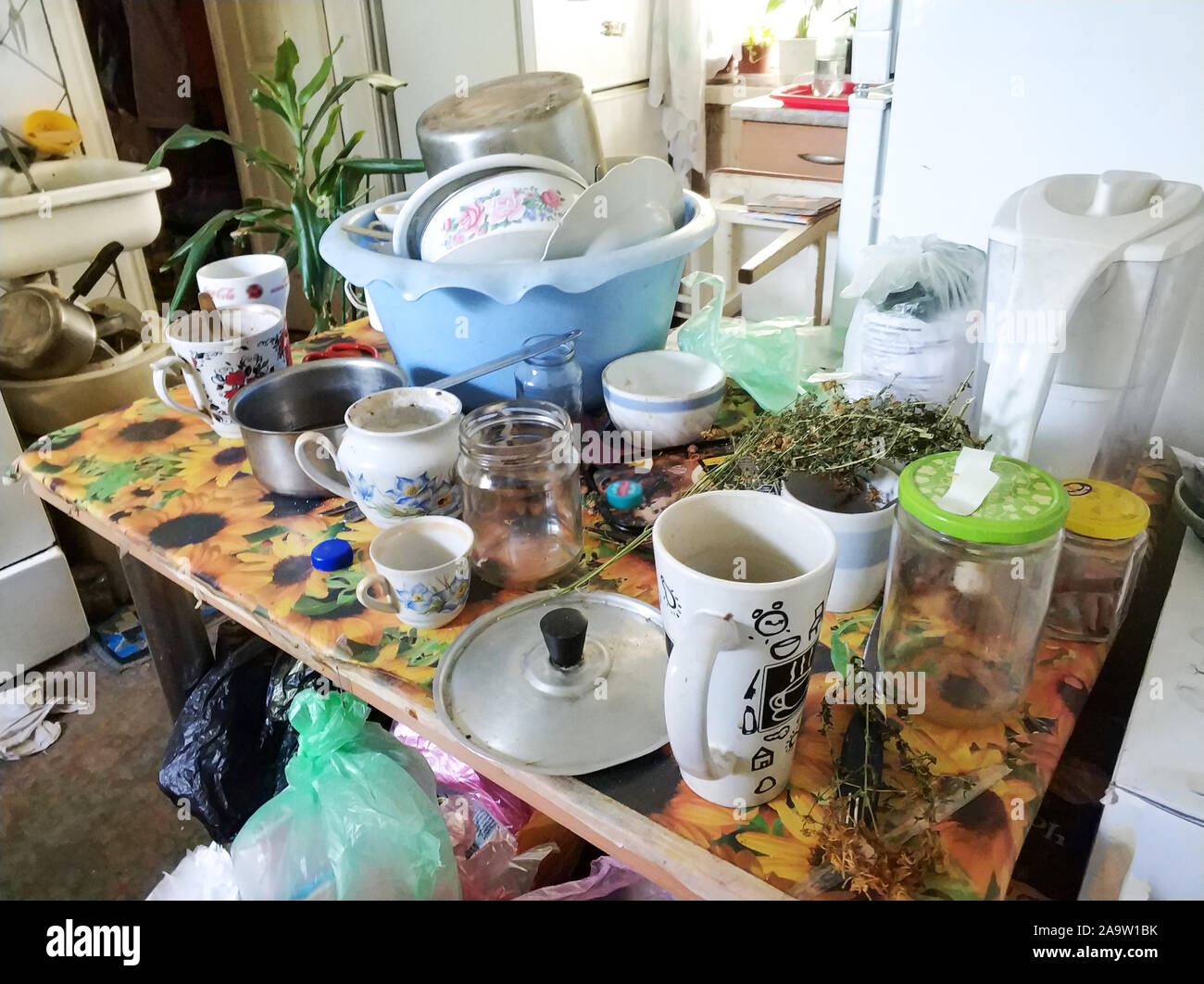 mess and dump. An old room with lots of things. Devastation. Very small