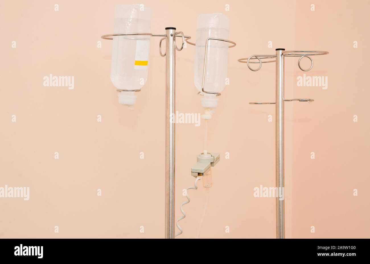 Cheap medical infusion systems with medicines in the poor hospital Stock Photo