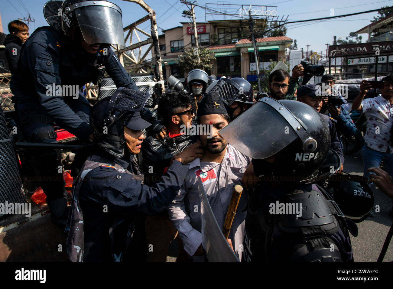 Kathmandu, Nepal. 18th Nov, 2019. Nepali police personnel arrest ...