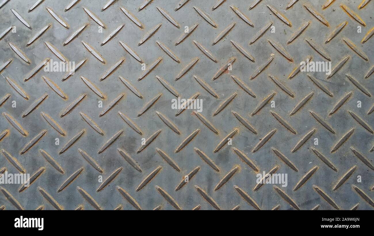 checker plate floor surface texture steel grip metal grating Stock Photo