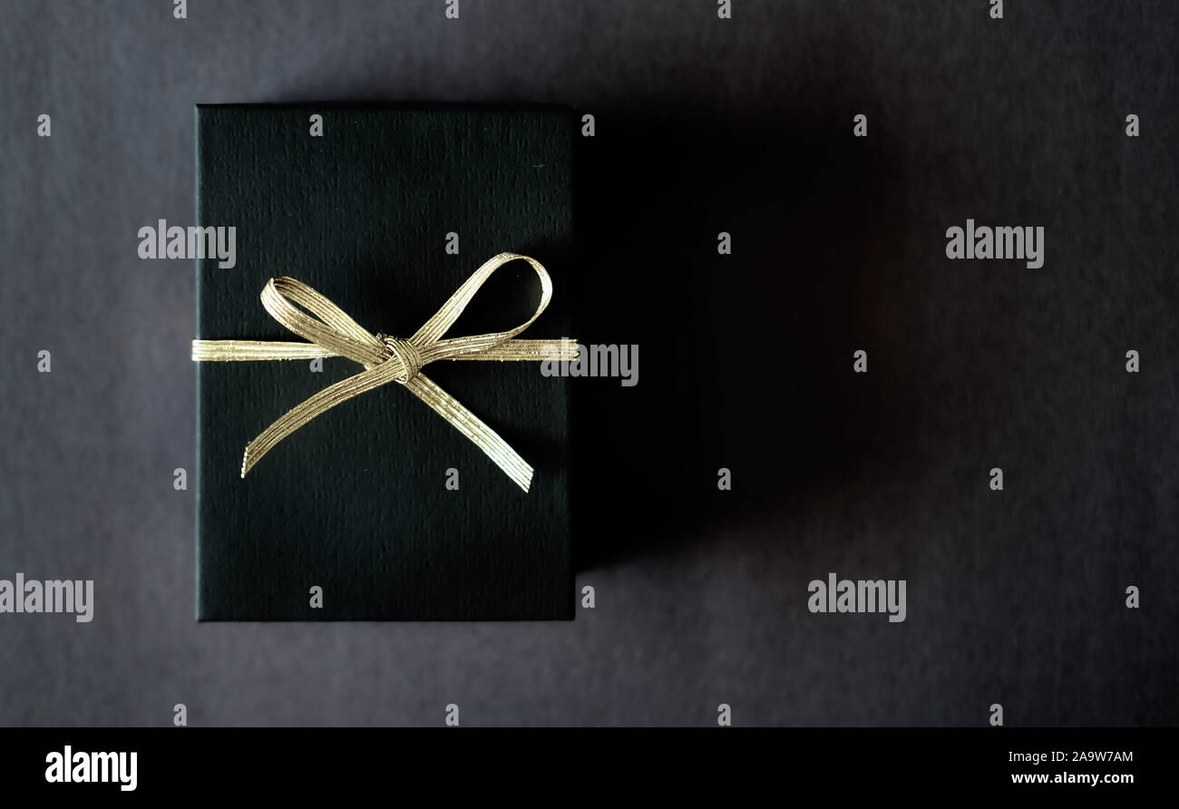 Black gift box dark background Stock Photo Alamy