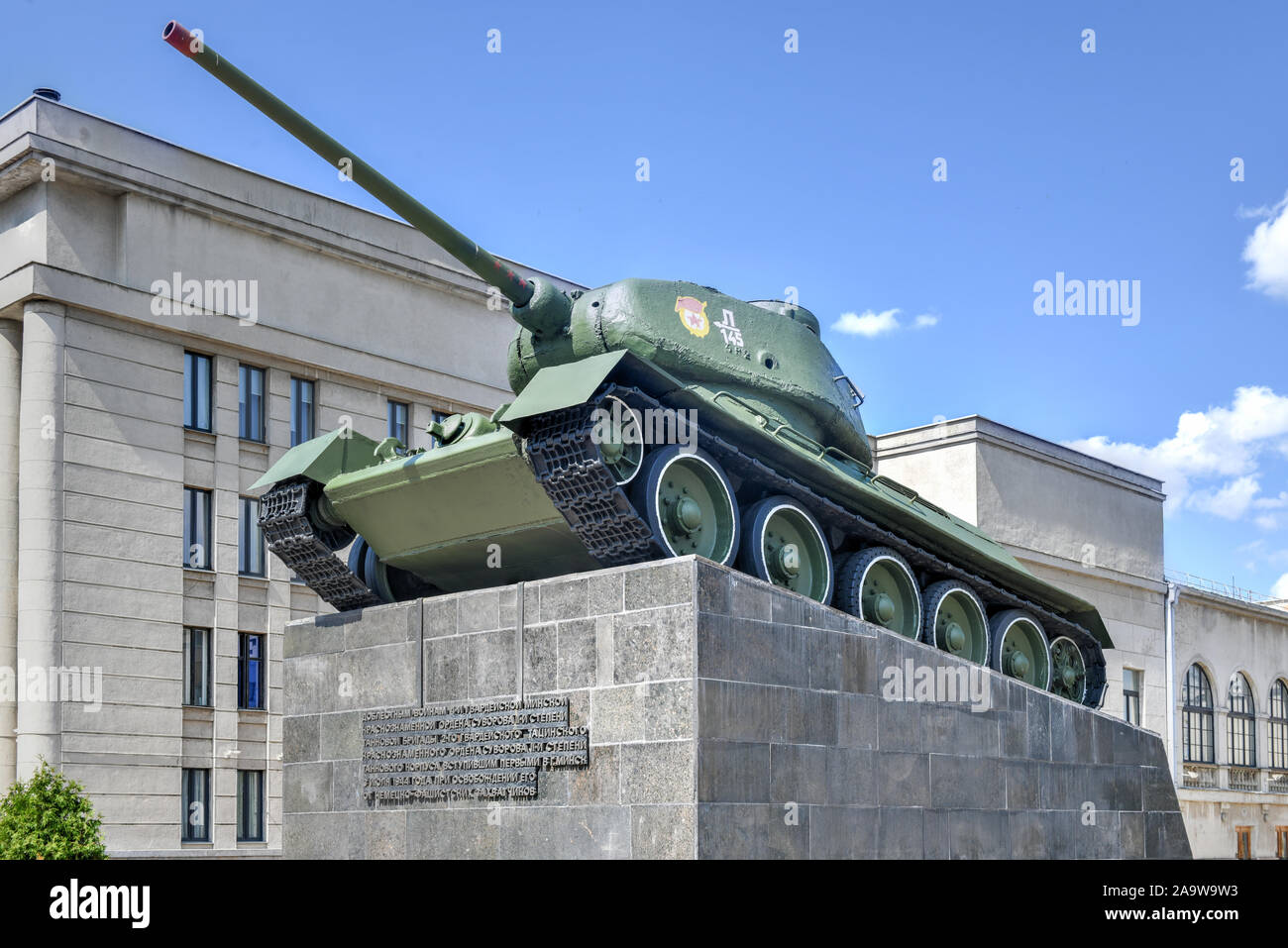 Soviet T-34/85 tank on a pedestal near the Army Headquarters in Minsk, Belarus. Dedicated to the Red Army that liberated the city in WW II. Stock Photo