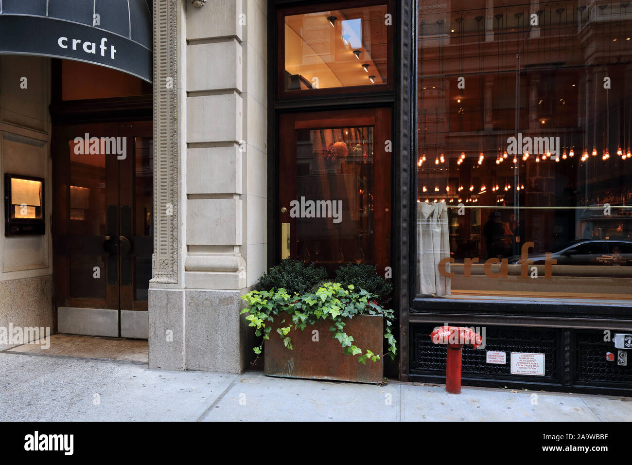 Craft, 43 East 19th Street, New York, NY. exterior storefront of a farm to table fine dining restaurant in the Flatiron district in Manhattan Stock Photo