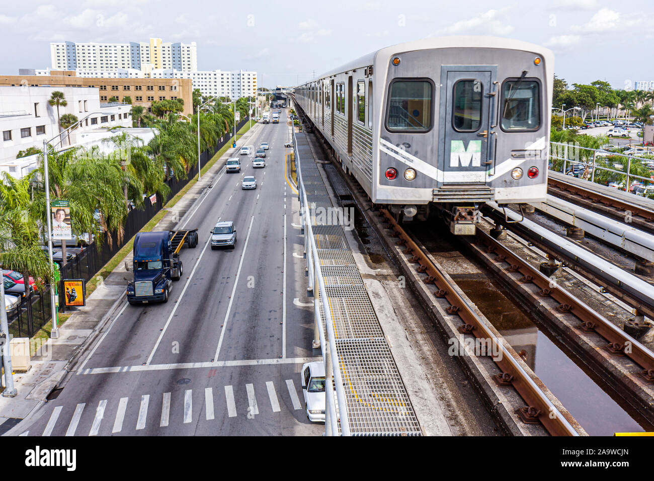 Miami Florida,12th Avenue NW,Metrorail,street traffic,raised rail,FL100207087 Stock Photo