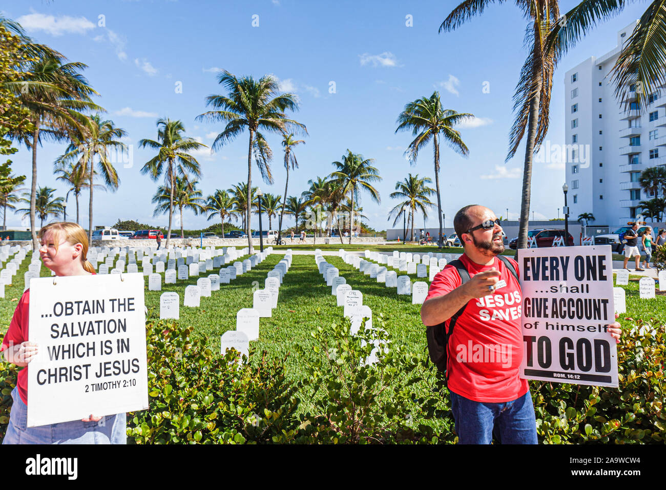 Miami Beach Florida,Lummus Park,street preacher,religion,sign,war dead memorial,tombstones,FL100207169 Stock Photo
