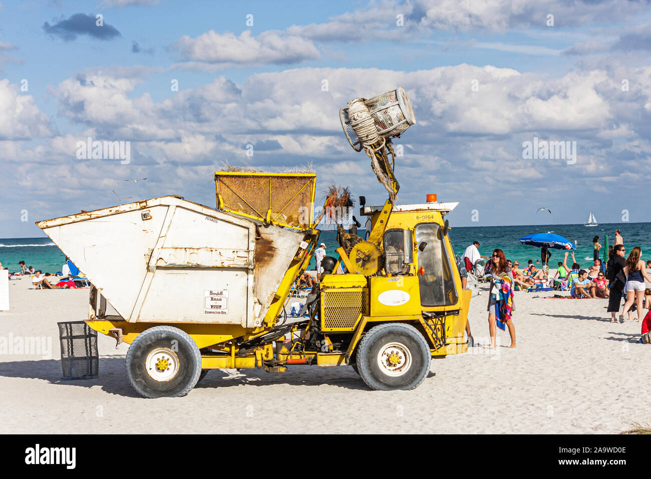 Miami Beach Florida,Atlantic Ocean,water,shore,garbage collector,trash can,FL100207199 Stock Photo