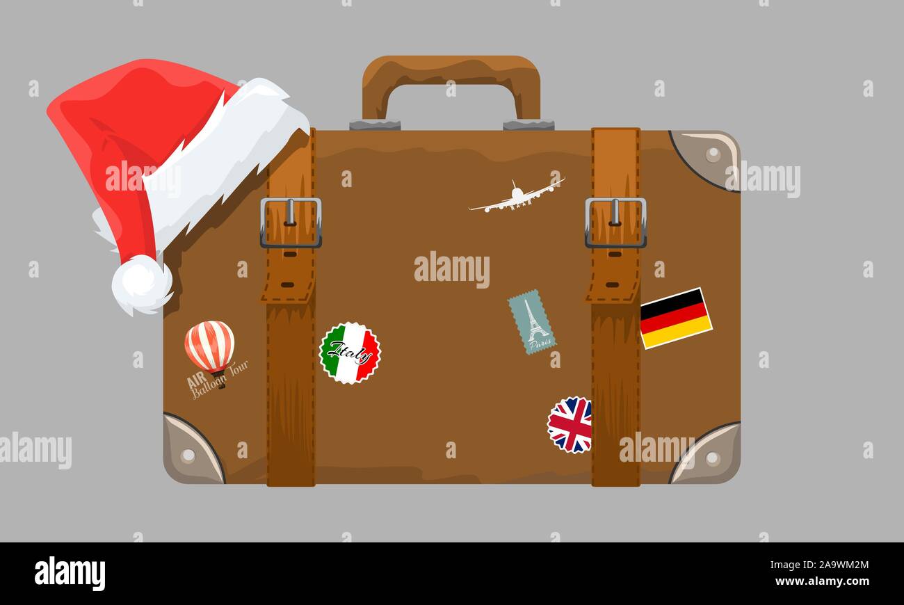 Old style vintage brown voyage suitcase with travel stickers and christmas or santa claus hat or cap. Vector illustration. Stock Vector