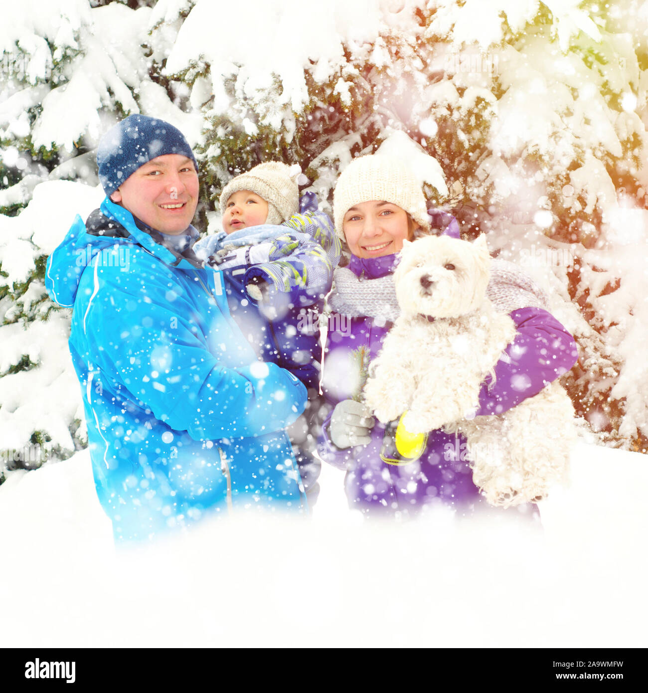 happy family in winter park Stock Photo