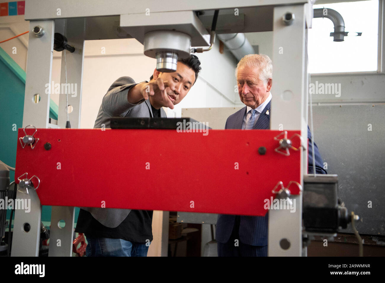 The Prince of Wales looks at the manufacturing process of products made out of plastic waste, during a visit to Critical Design, an Auckland based company that manufactures a range of office and homeware products from recycled materials, at Wesley Intermediate School in Auckland on the second day of the royal visit to New Zealand. PA Photo. Picture date: Monday November 18, 2019. See PA story ROYAL Tour. Photo credit should read: Victoria Jones/PA Wire Stock Photo