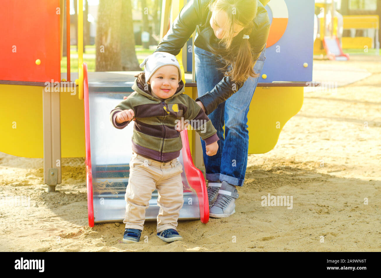 mother and baby at the playground Stock Photo - Alamy