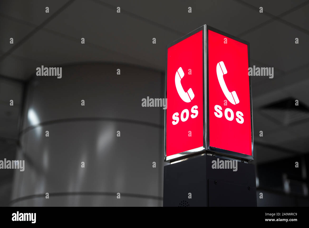 SOS emergency call information signs installed in public facilities. Stock Photo