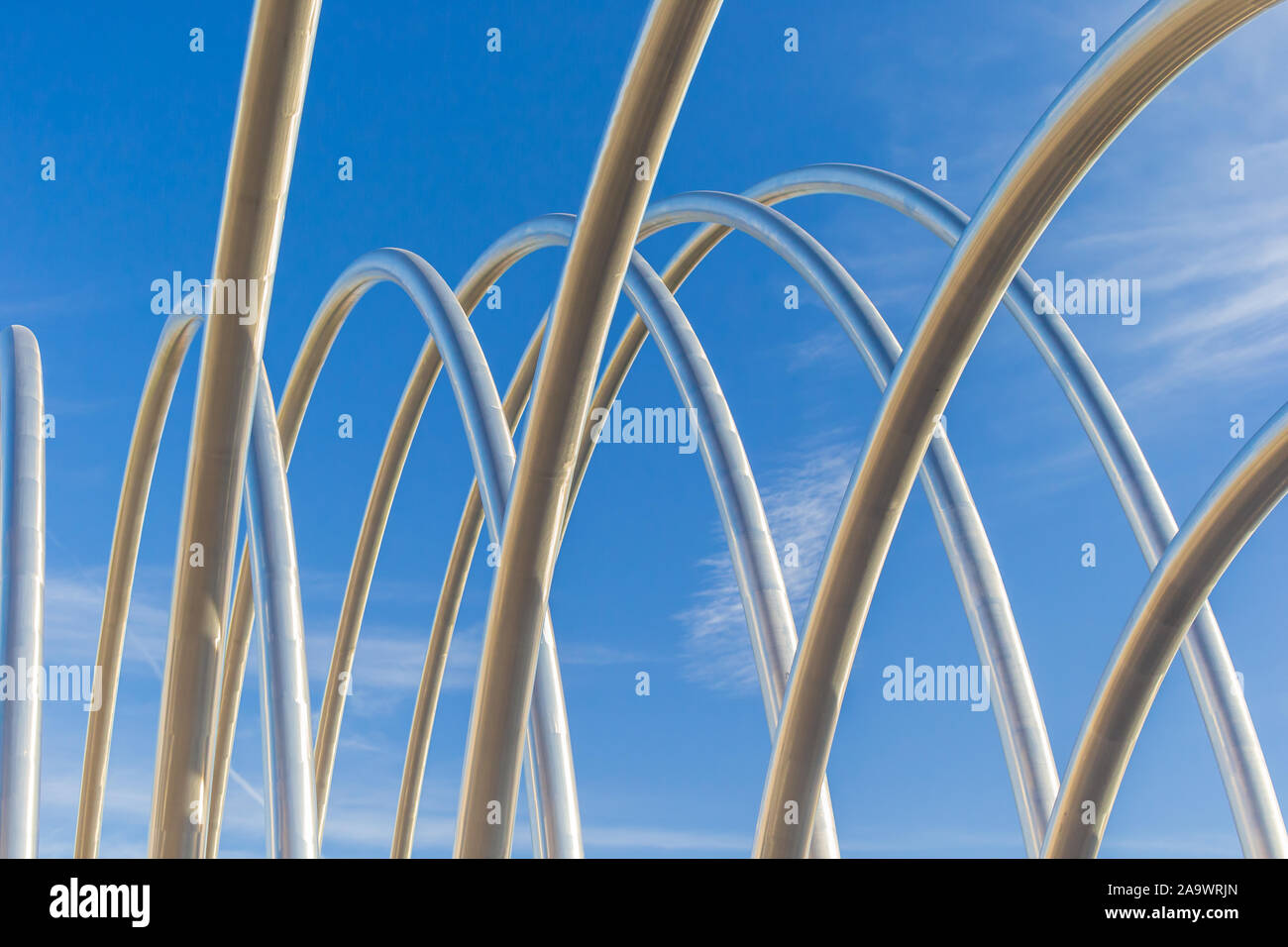 Abstract steel pipes rising into the sky Stock Photo