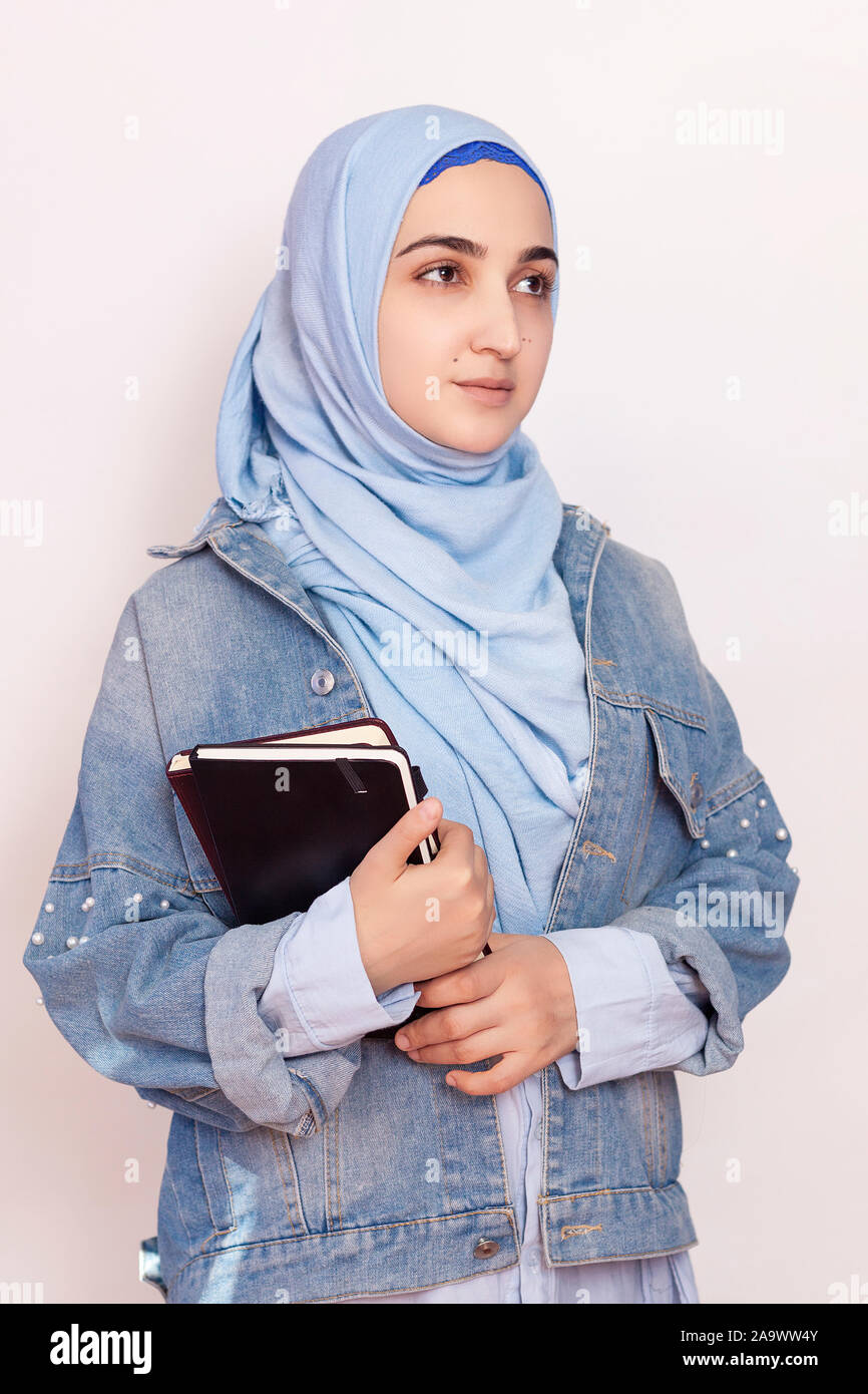 Portrait of cute Muslim businesswoman. Attractive Muslim student ...