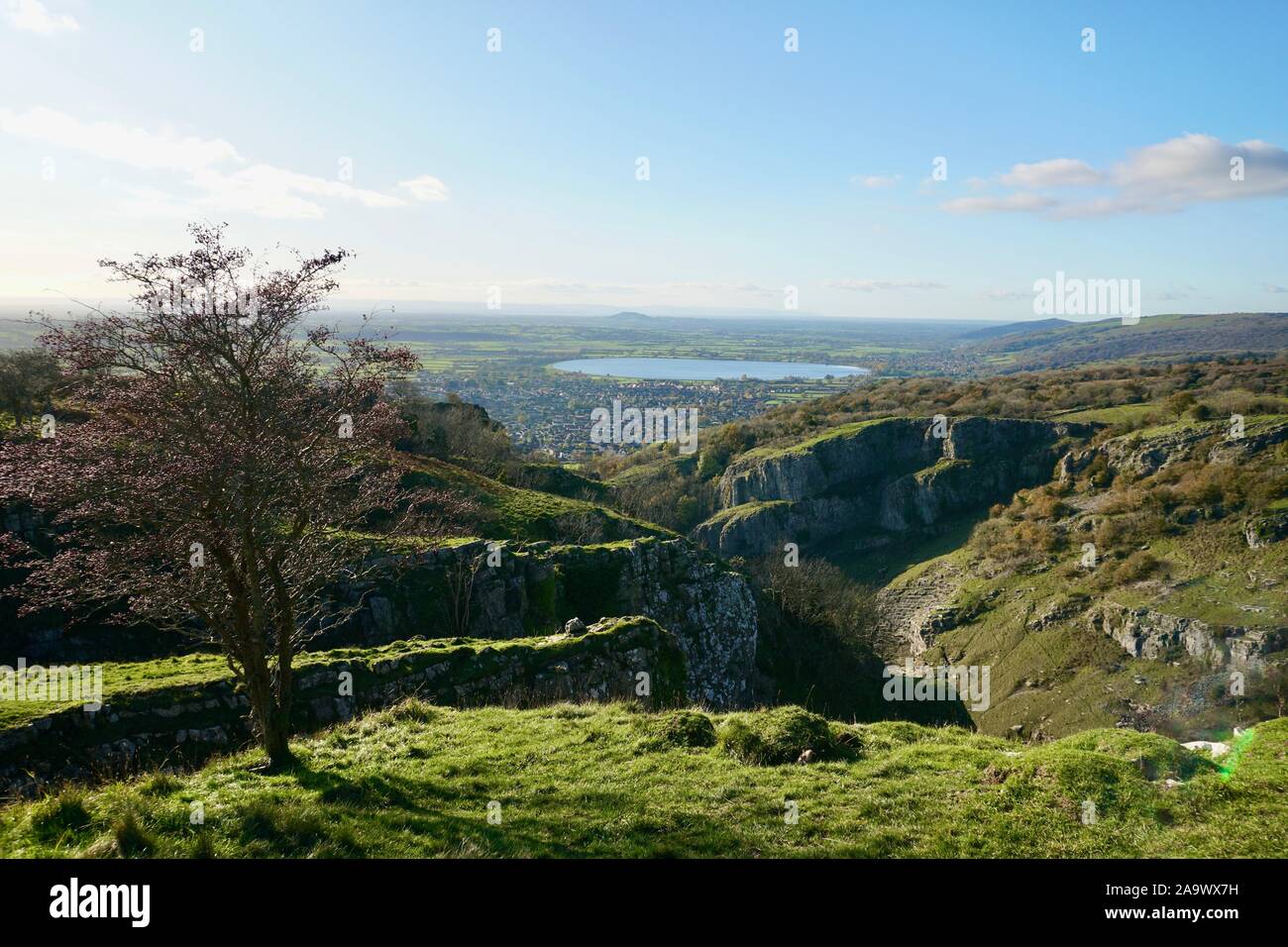View from the top of the east cliff of Cheddar Gorge, Somerset, England, looking towards Cheddar Reservoir Stock Photo