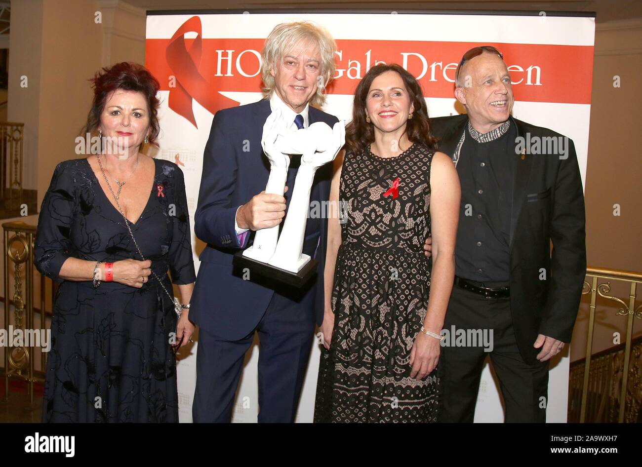 Dresden, Deutschland. 16th Nov, 2019. Viola Klein, Sir Bob Geldof, Annett Hoffmann and Stefan Hippler, 14th HOPE Gala supporting the project HOPE Cape Town in the fight against HIV and AIDS in South Africa in the Schauspielhaus Dresden | usage worldwide Credit: dpa/Alamy Live News Stock Photo