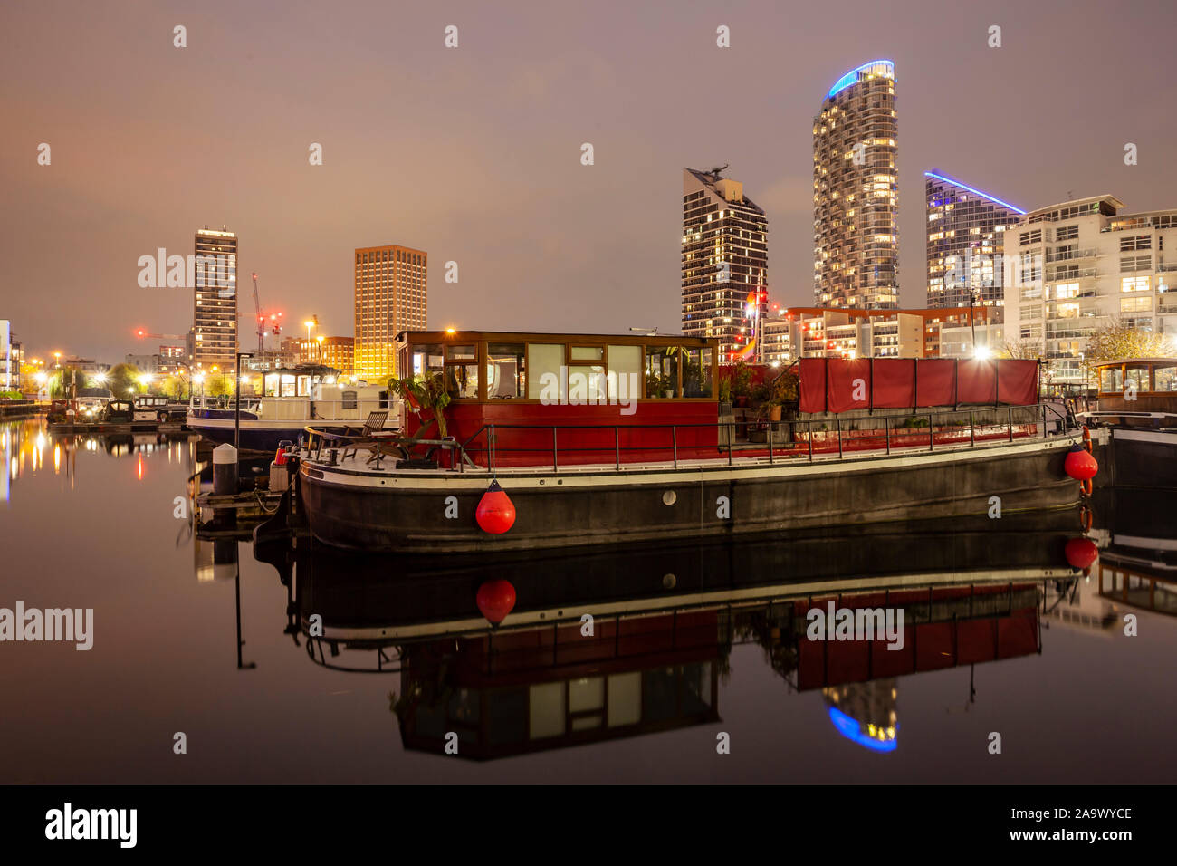 Night falls on the docklands in London, England. Stock Photo